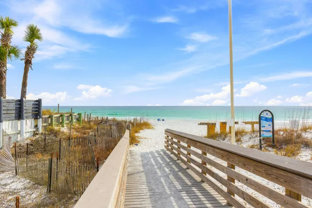 a view of a terrace with wooden floor and seating space