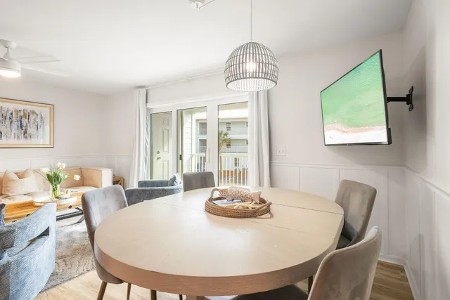 a view of a dining room with furniture window and outside view