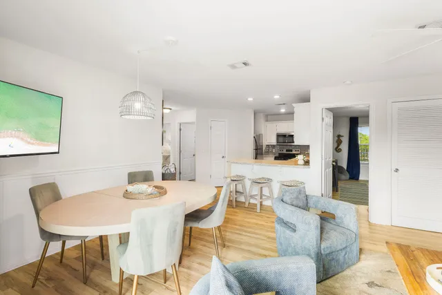 a view of a dining room with furniture