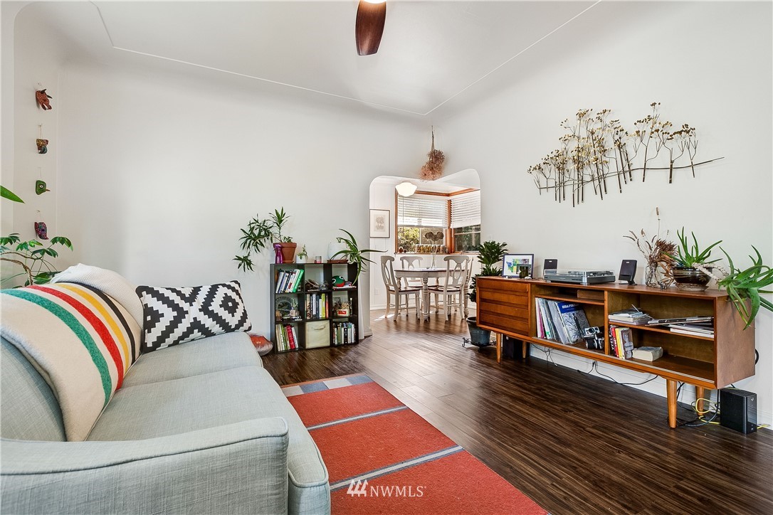 834 15th Avenue Seattle, WA 98122 - Photo 9 of 23 a living room with furniture and wooden floor