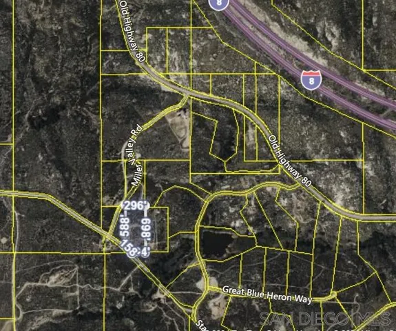 a bathroom with a shower and a mirror