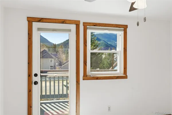 a view of empty room with windows