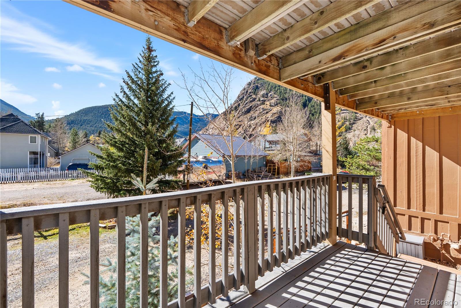 1463 Main Street Georgetown, CO 80444 - Photo 26 of 47 a view of a balcony with wooden floor