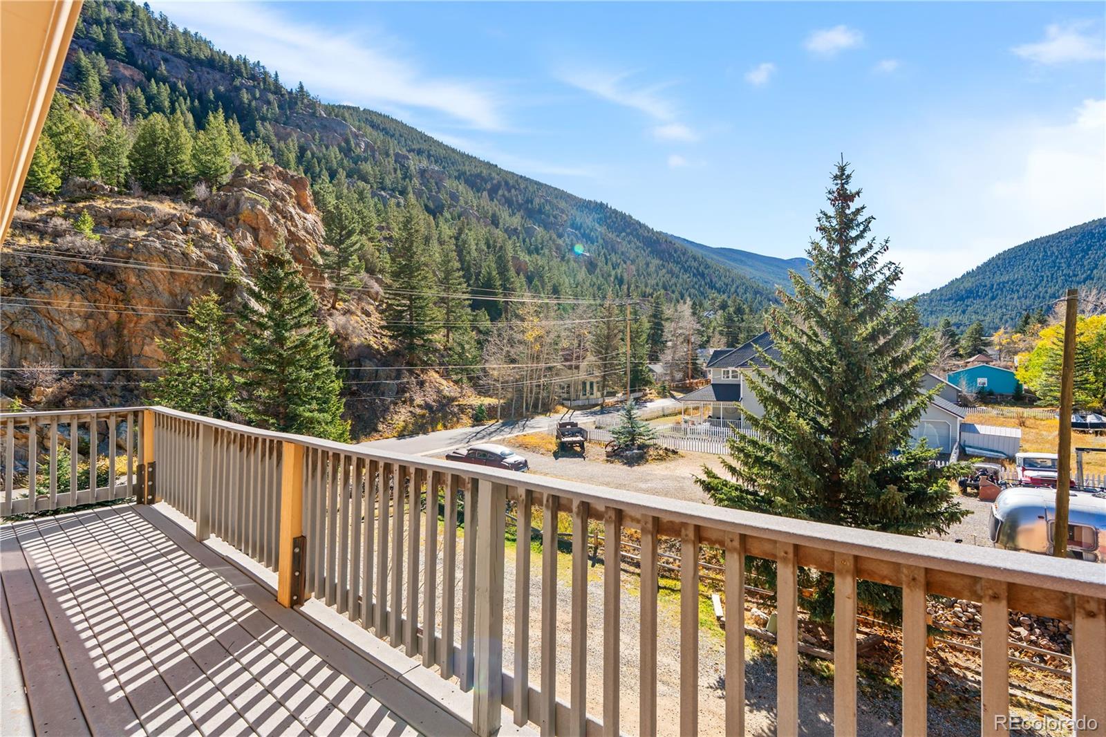 1463 Main Street Georgetown, CO 80444 - Photo 28 of 47 a view of a balcony with wooden floor