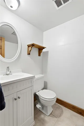 front view of a house with a large window