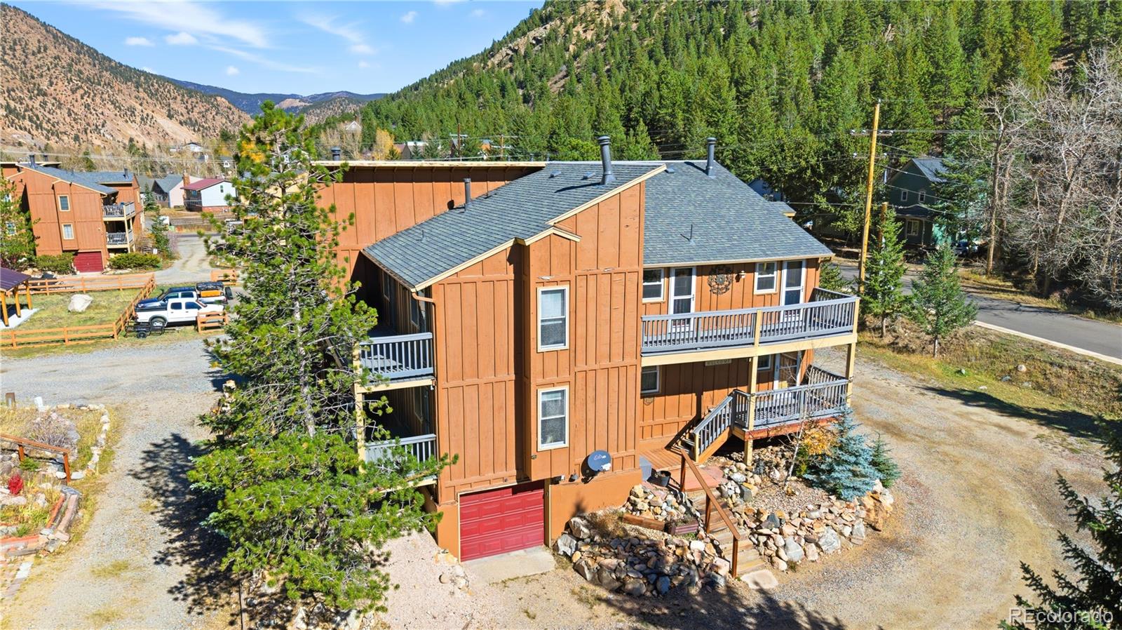 1463 Main Street Georgetown, CO 80444 - Photo 38 of 47 an aerial view of a house with garden