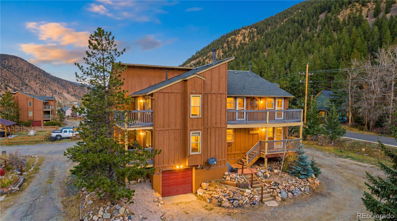 1463 Main Street Georgetown, CO 80444 - Photo 43 of 47 a front view of a house with garden