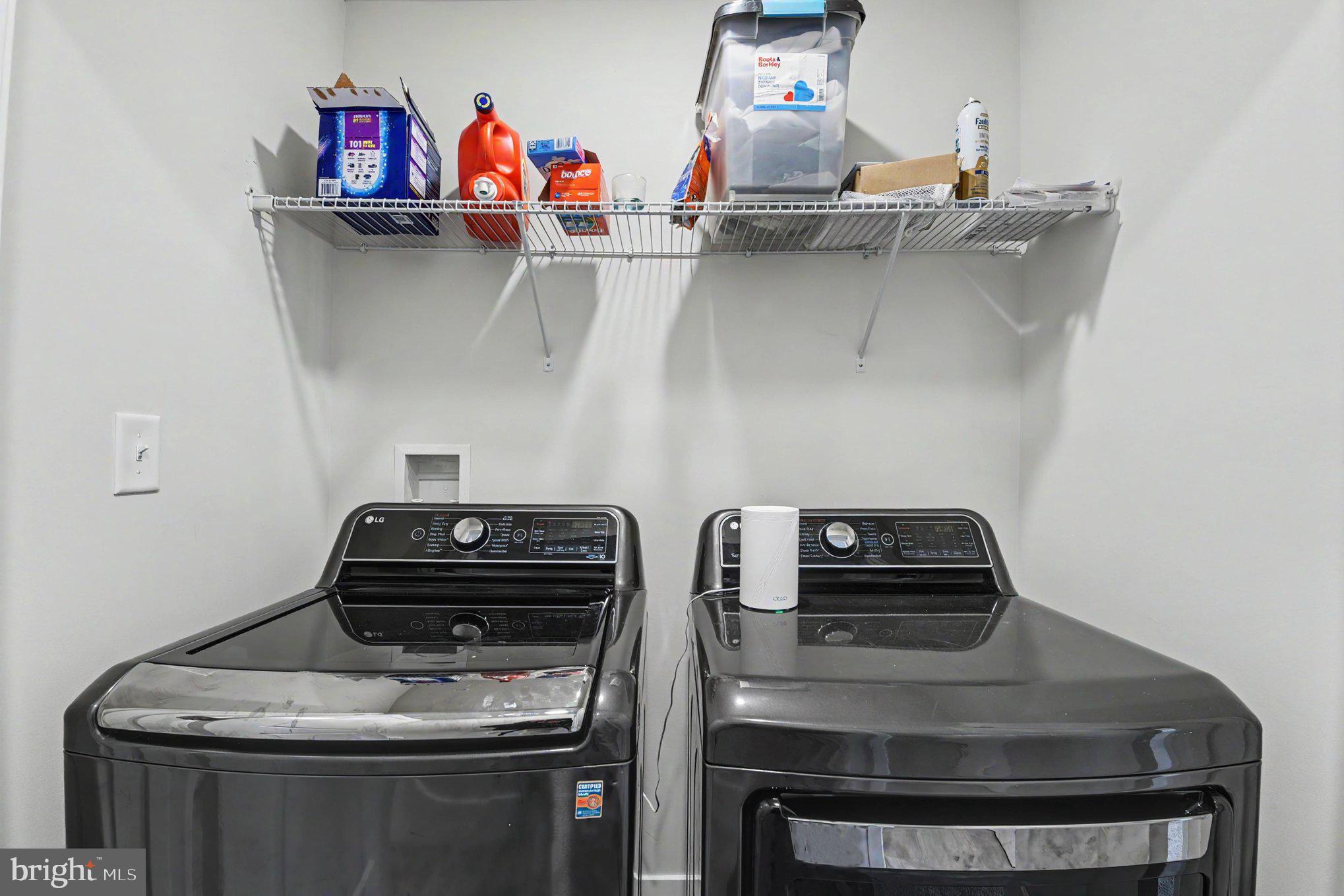 238 Waterstone Road Essex, MD 21221 - Photo 33 of 39 a utility room with dryer and washer