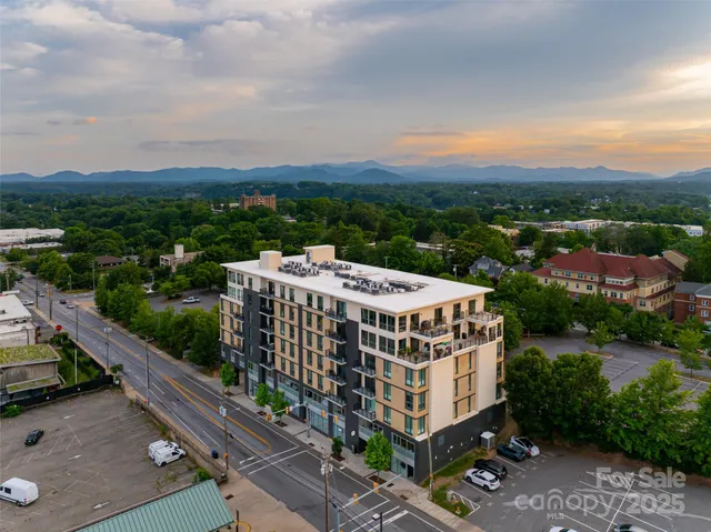 a view of a buildings in front of the city