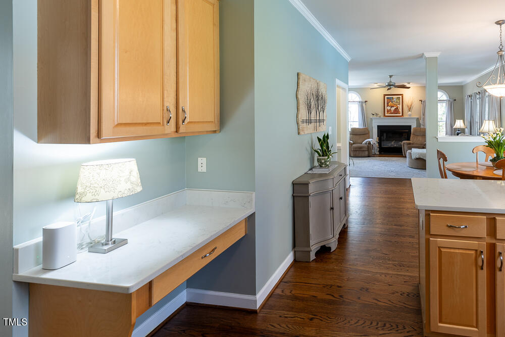 5924 North Hawthorne Way Raleigh, NC 27613 - Photo 11 of 45 a living room with furniture and a wooden floor