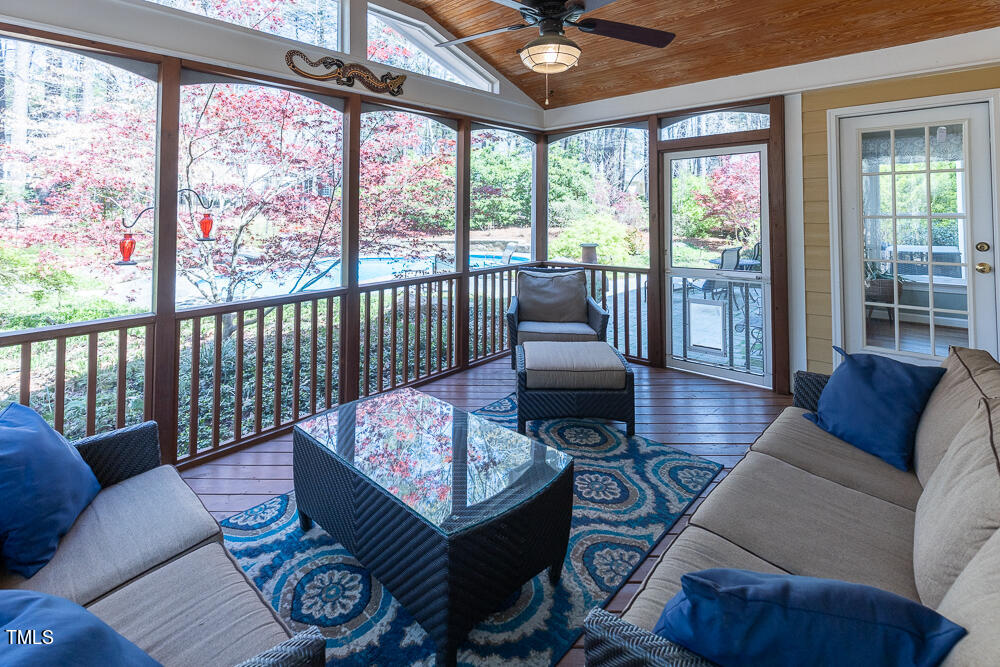 5924 North Hawthorne Way Raleigh, NC 27613 - Photo 20 of 45 a living room with furniture and a large window