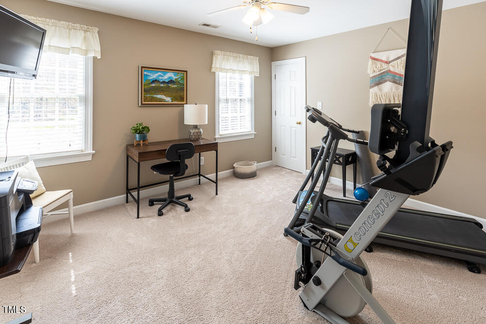 5924 North Hawthorne Way Raleigh, NC 27613 - Photo 28 of 45 a view of a room with gym equipment