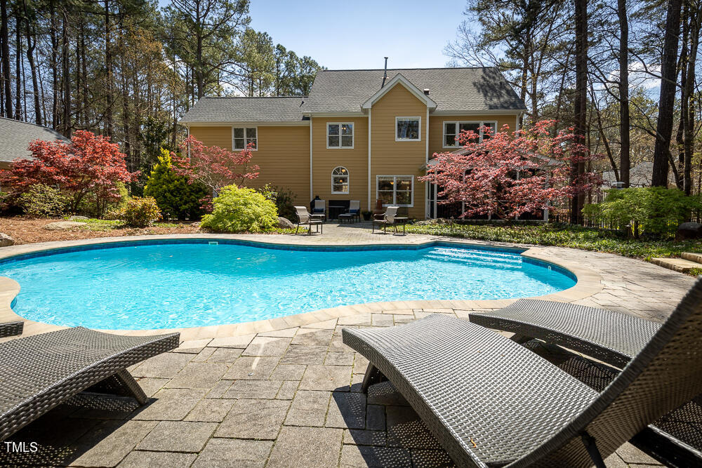 5924 North Hawthorne Way Raleigh, NC 27613 - Photo 34 of 45 a front view of a house with garden