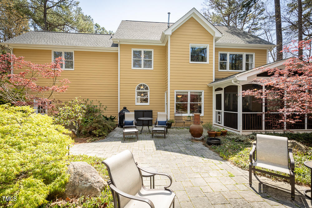 5924 North Hawthorne Way Raleigh, NC 27613 - Photo 41 of 45 a view of a house with a patio