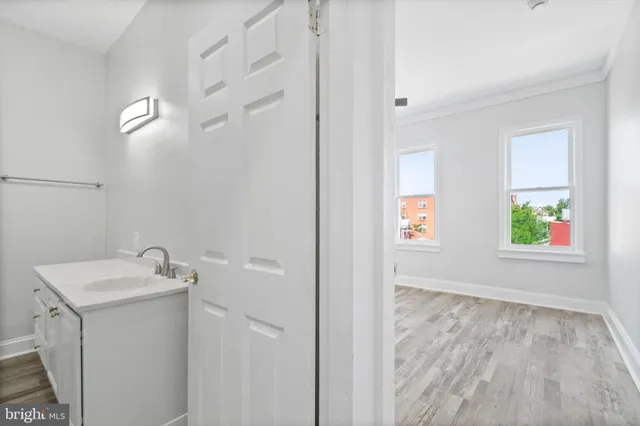 a bathroom with a sink and a shower
