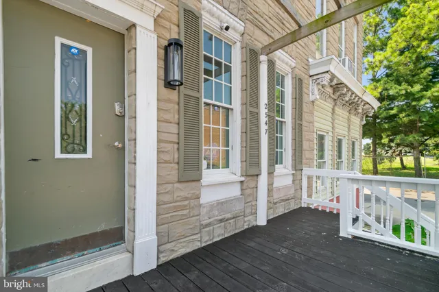 a view of a livingroom with wooden floor