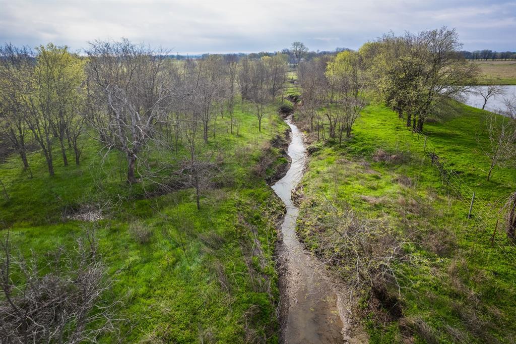 Lot 1 Dry Branch Road Forreston, TX 76041 - Photo 4 of 5 a view of a lake with a city