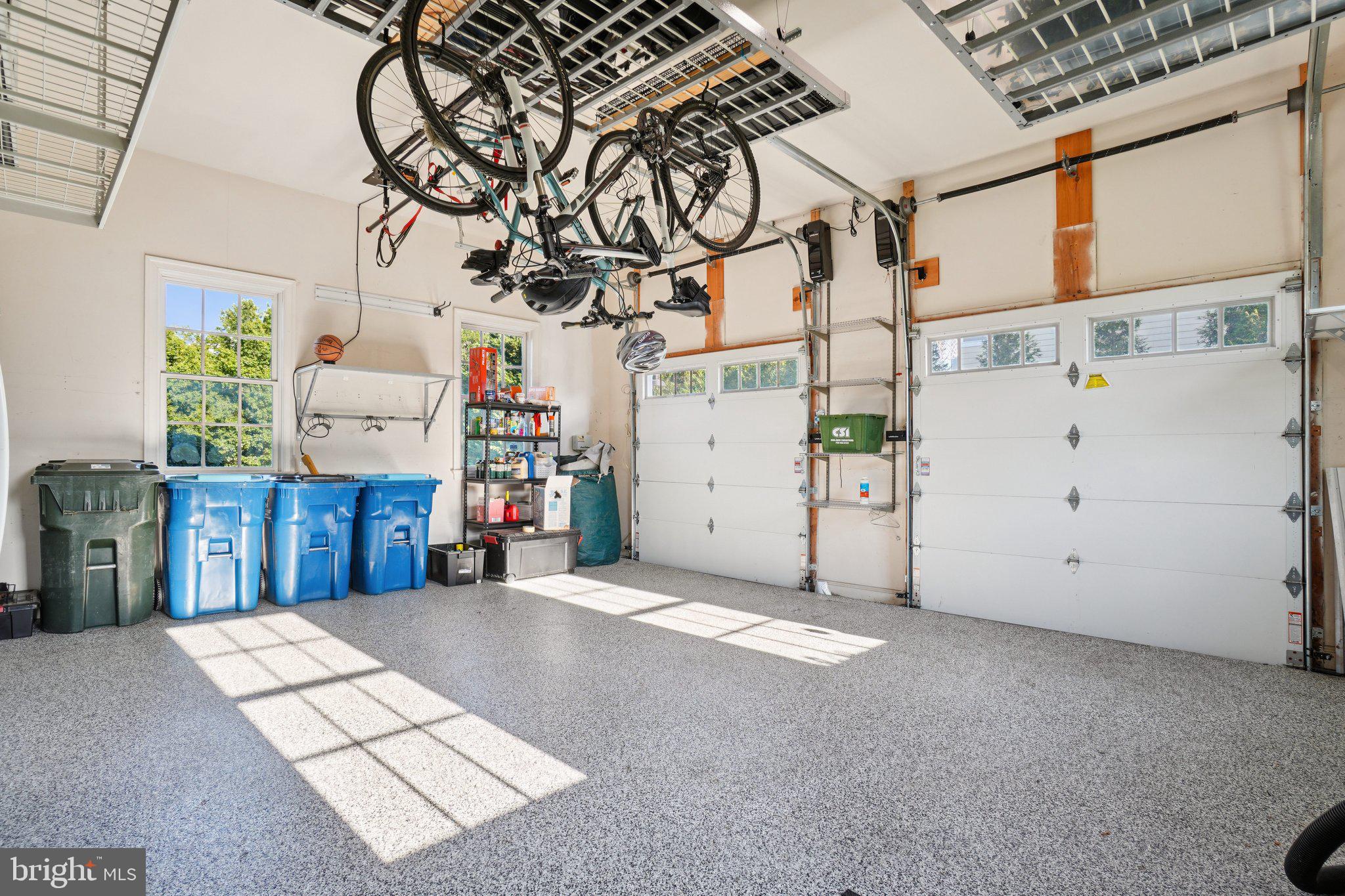 20872 Eckbo Drive Leesburg, VA 20175 - Photo 82 of 96 Garage with automatic lifts, raised garage doors!!
