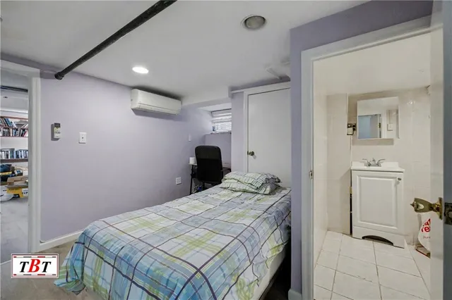 a bedroom with a bed and a closet