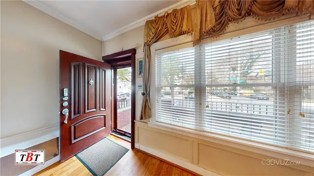 a view of a balcony and front door