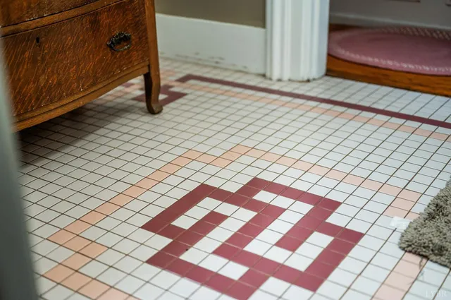 an aerial view of residential houses with outdoor space and river