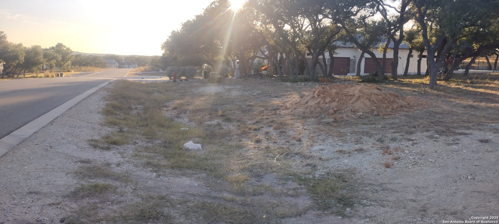 954 Maximino Rdg Road Bulverde, TX 78163 - Photo 4 of 5 a view of road and trees