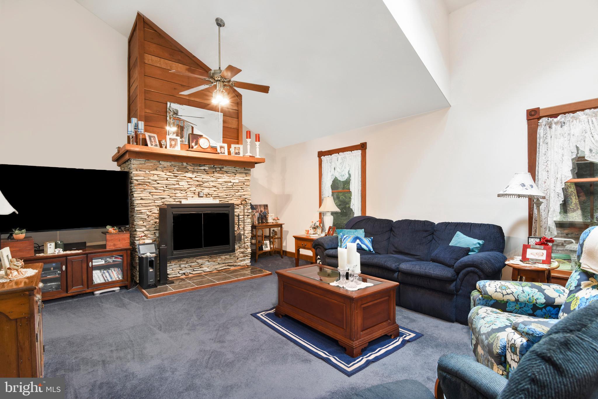 369 Hutton Road Elkton, MD 21921 - Photo 19 of 42 The beautiful living room with wood-burning FP