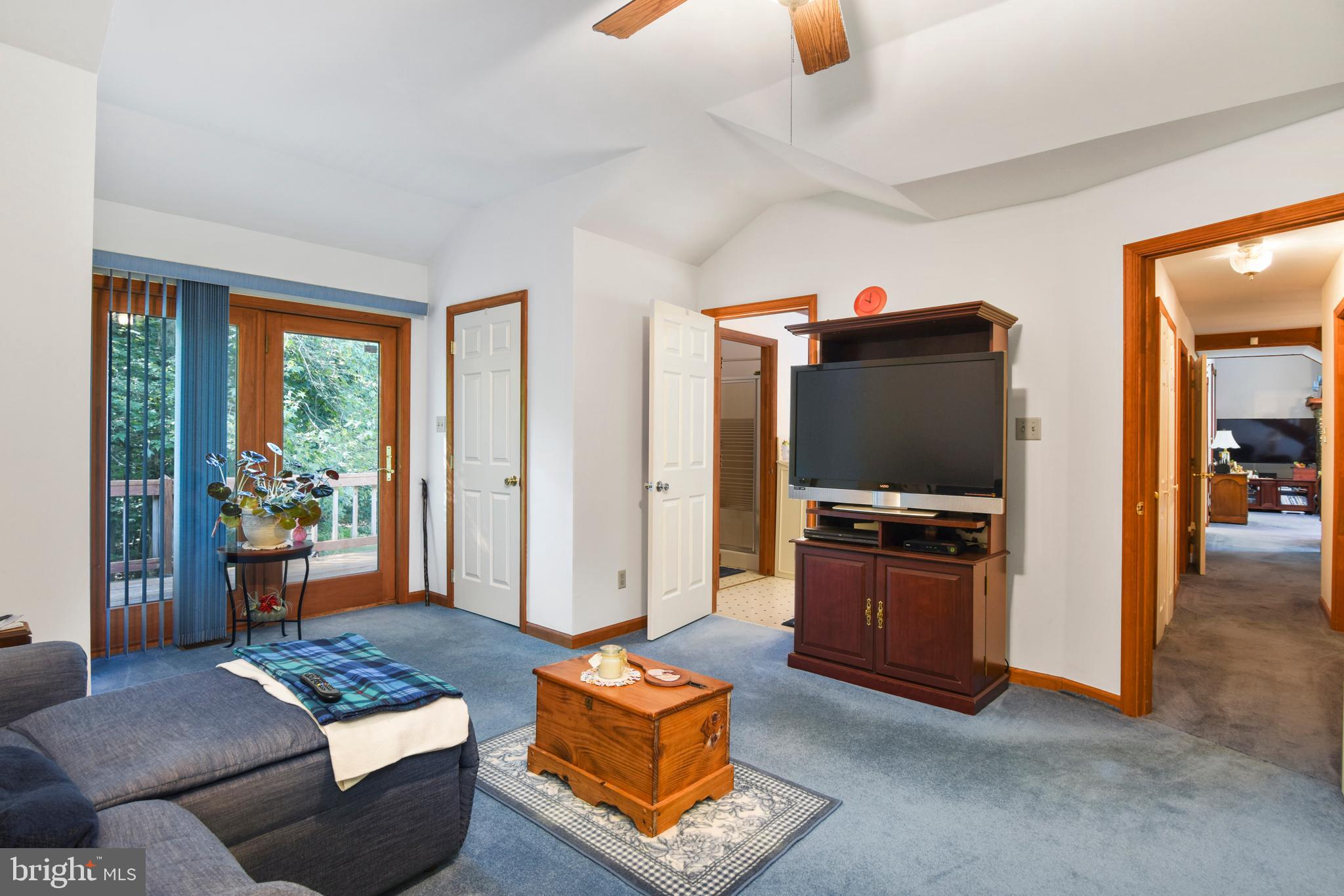 369 Hutton Road Elkton, MD 21921 - Photo 32 of 42 Master Bedroom TV area with door to rear deck