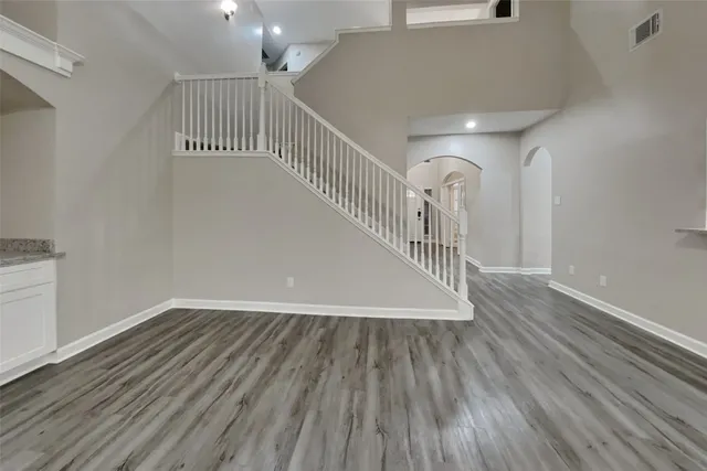 a view of entryway with wooden floor