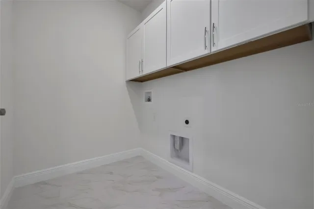 a bathroom with a white bath tub