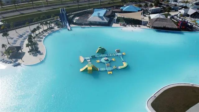 a view of a lake with a yard