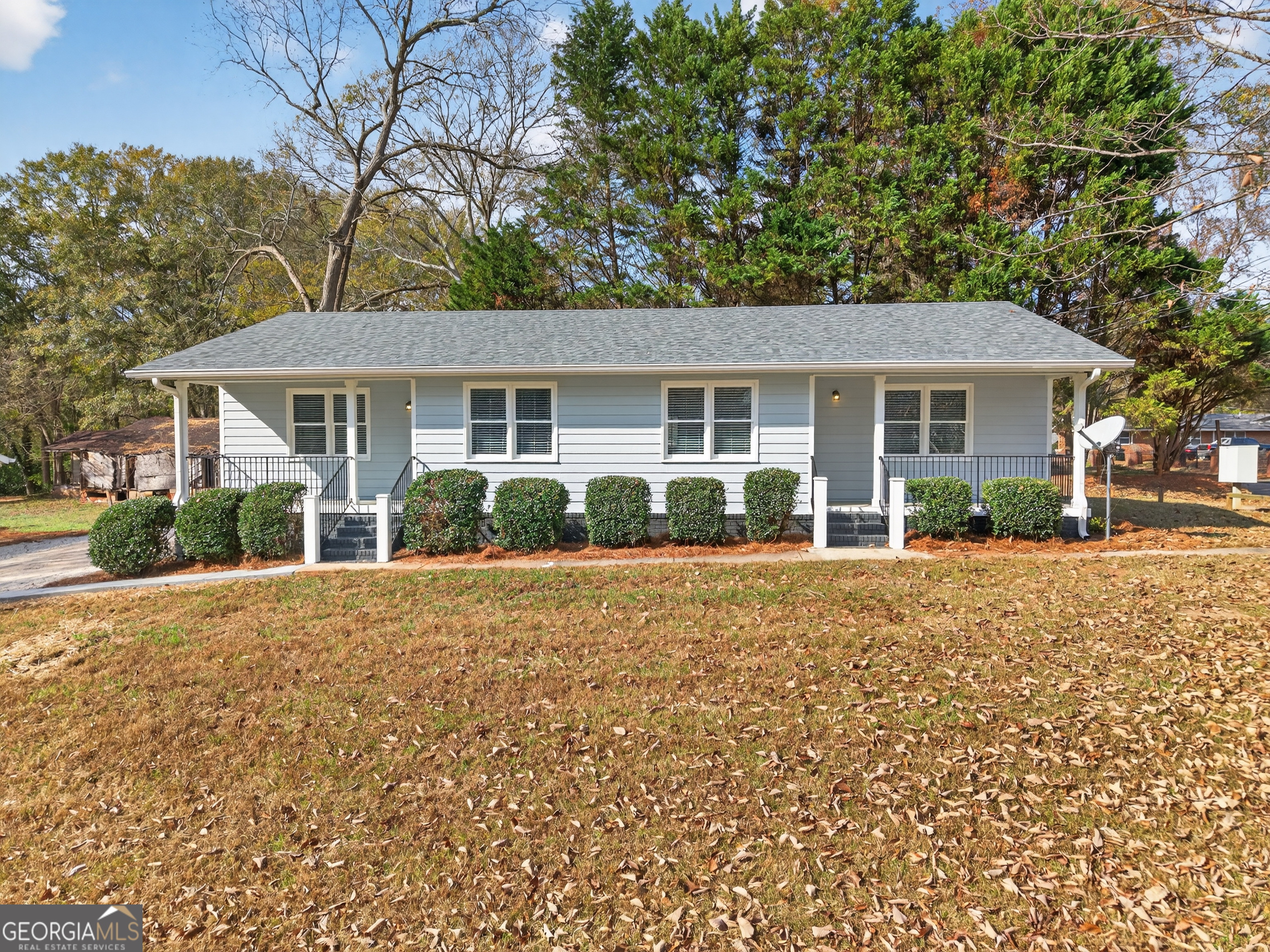 front view of a house with a patio