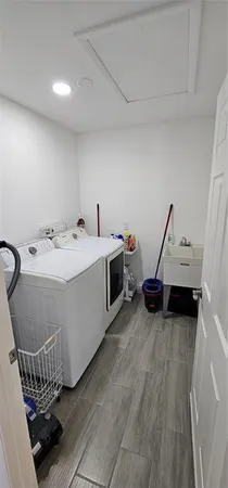 a utility room with dryer and washer