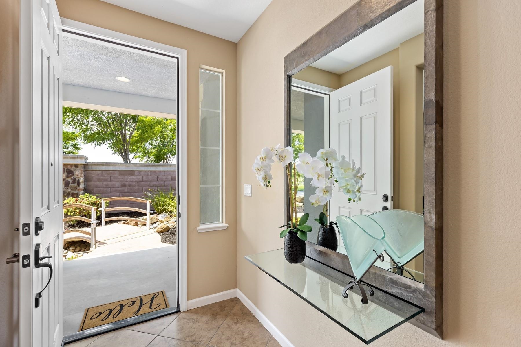 9901 Pyramid Way Discovery Bay, CA 94505 - Photo 12 of 53 a dining room with furniture and a potted plant