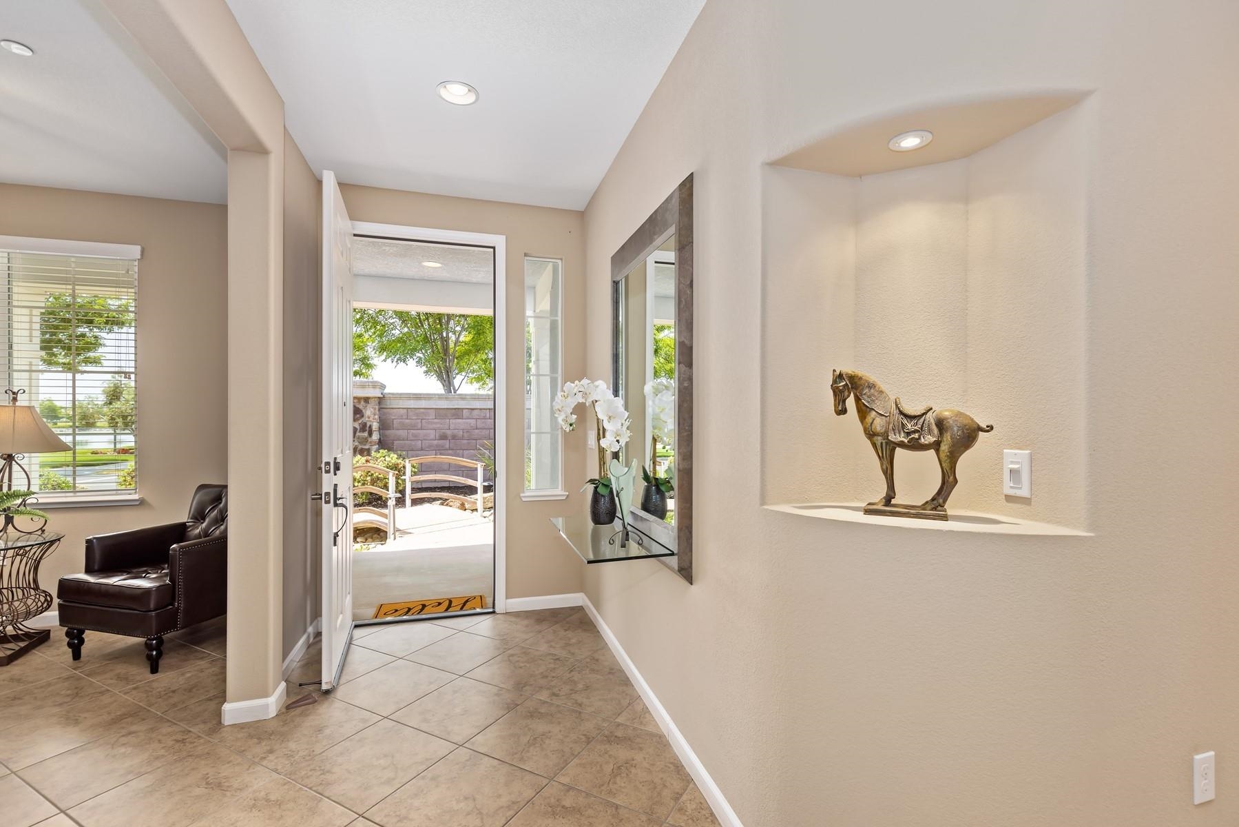 9901 Pyramid Way Discovery Bay, CA 94505 - Photo 13 of 53 a view of a hallway with furniture and windows