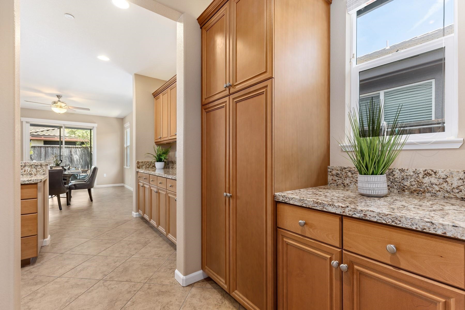9901 Pyramid Way Discovery Bay, CA 94505 - Photo 18 of 53 a kitchen with stainless steel appliances granite countertop cabinets and glass door
