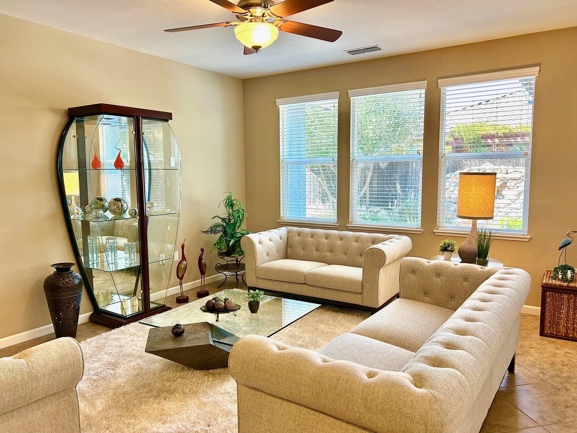 9901 Pyramid Way Discovery Bay, CA 94505 - Photo 20 of 53 a living room with furniture and a large window