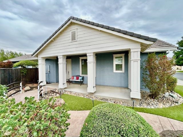 9901 Pyramid Way Discovery Bay, CA 94505 - Photo 2 of 53 a front view of house with yard and outdoor seating