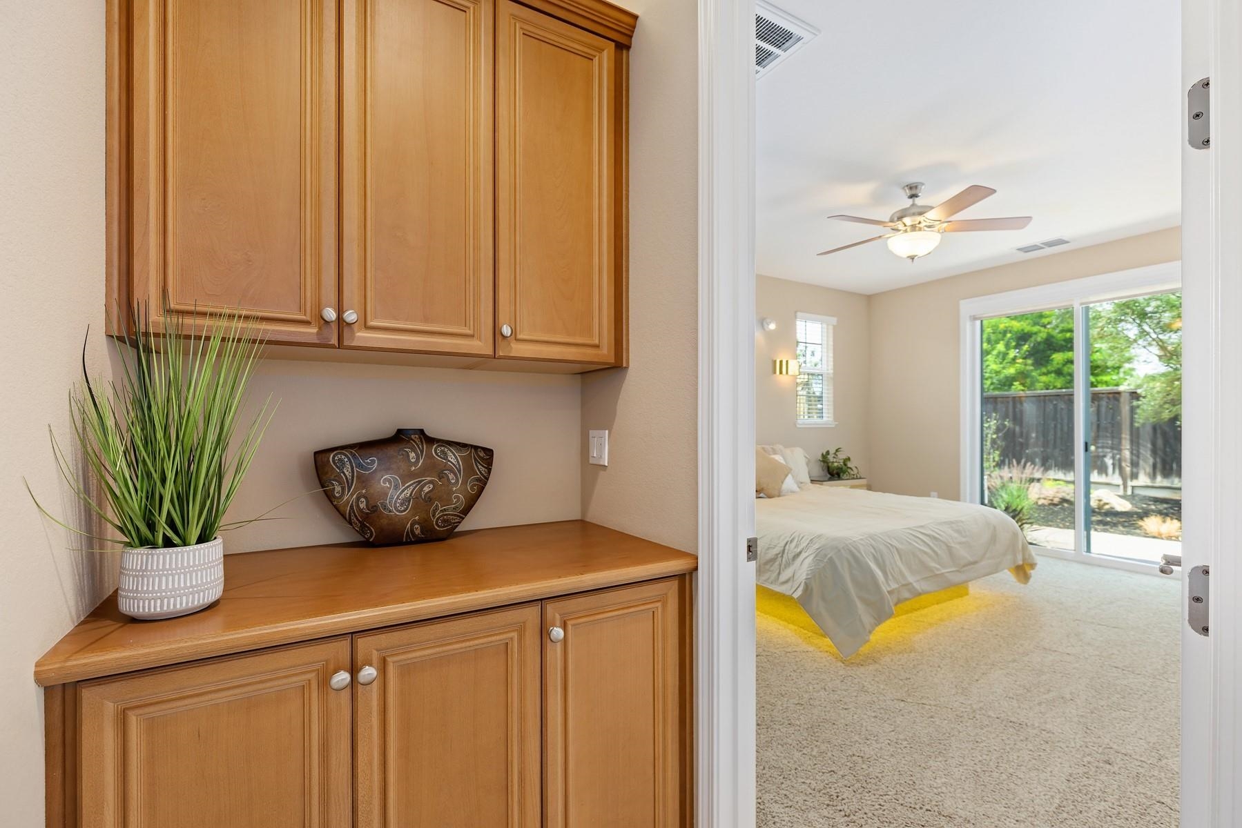 9901 Pyramid Way Discovery Bay, CA 94505 - Photo 22 of 53 a bedroom with a bed and ceiling fan