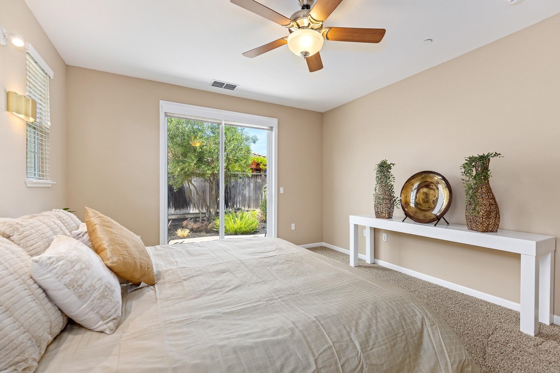 9901 Pyramid Way Discovery Bay, CA 94505 - Photo 24 of 53 a bedroom with a bed and window