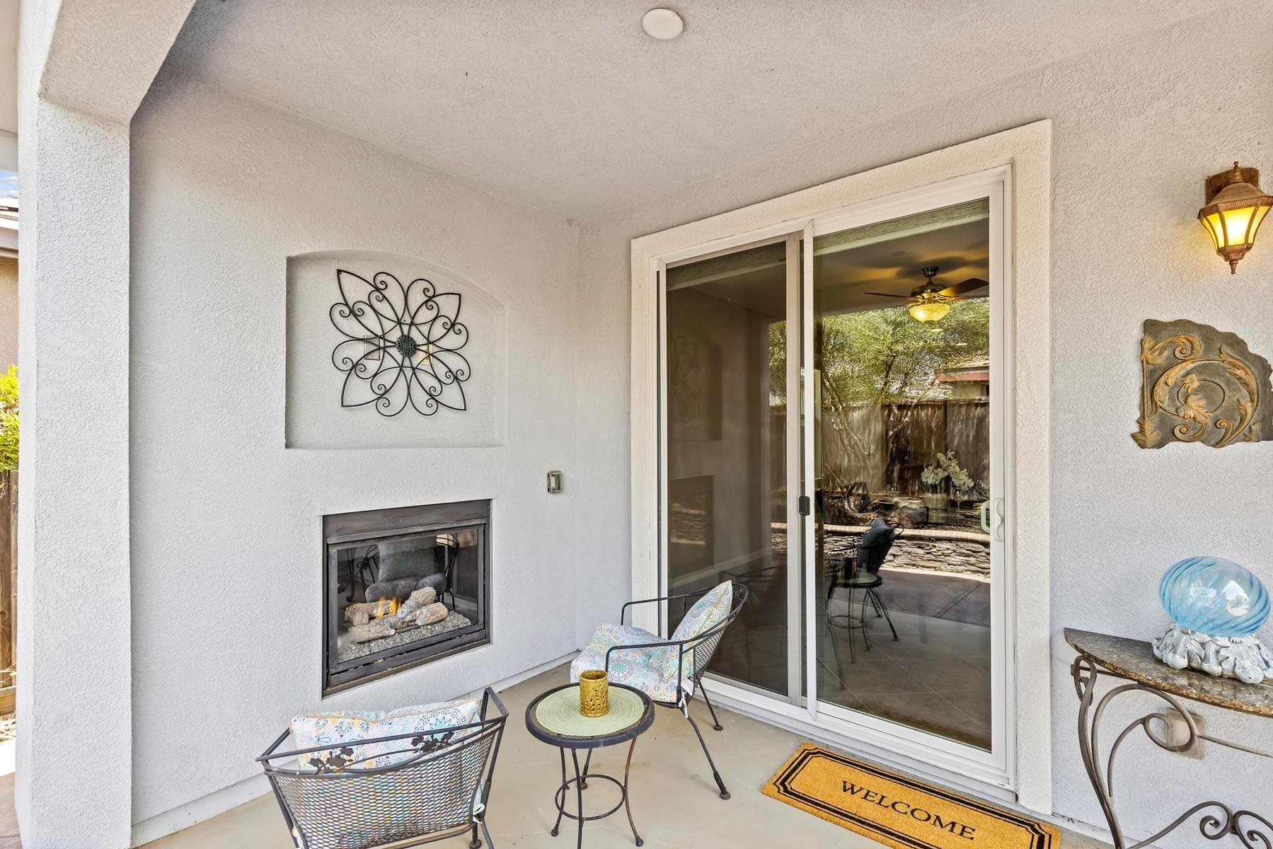 9901 Pyramid Way Discovery Bay, CA 94505 - Photo 36 of 53 a living room with furniture and a fireplace