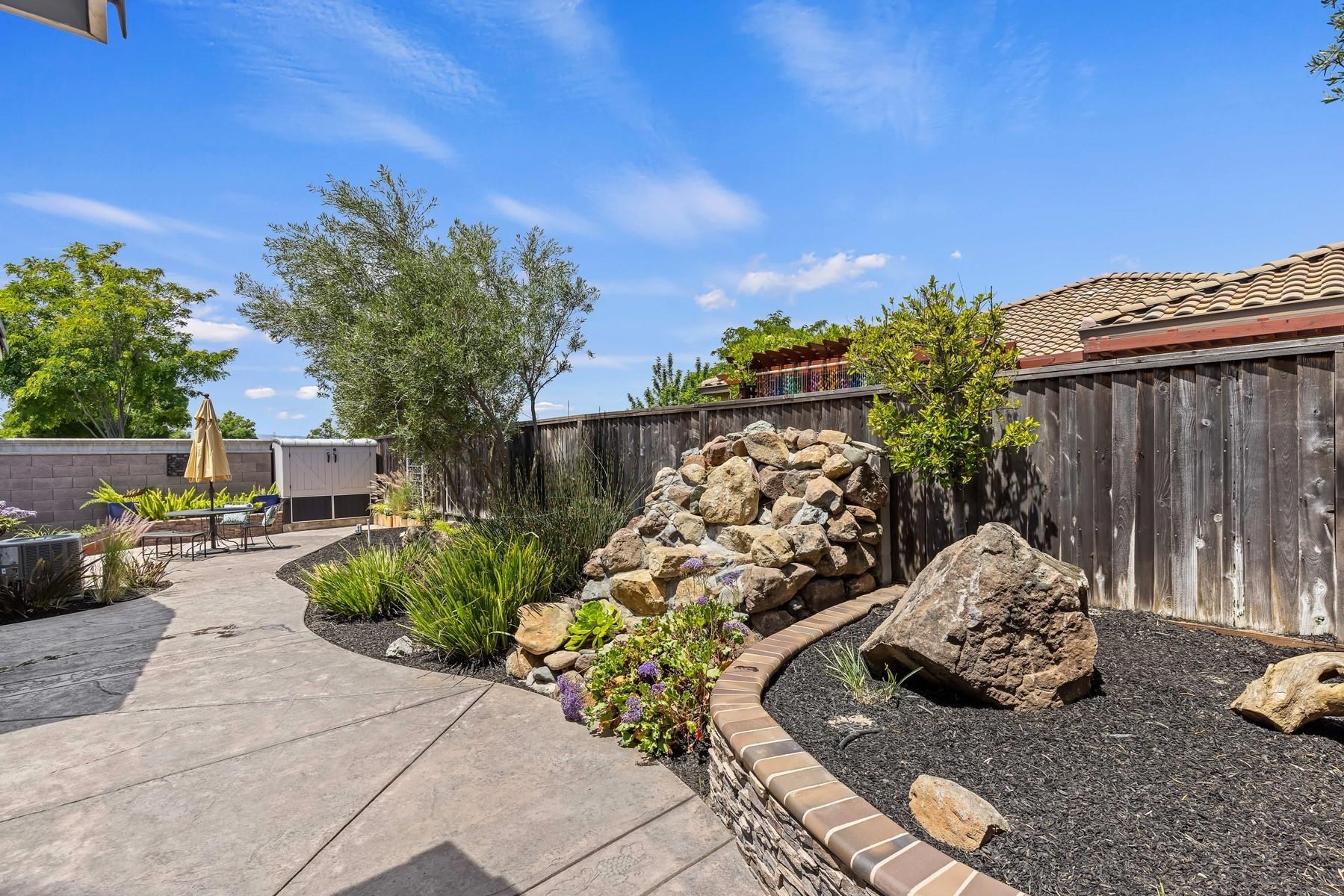 9901 Pyramid Way Discovery Bay, CA 94505 - Photo 39 of 53 a flower plants and wooden fence