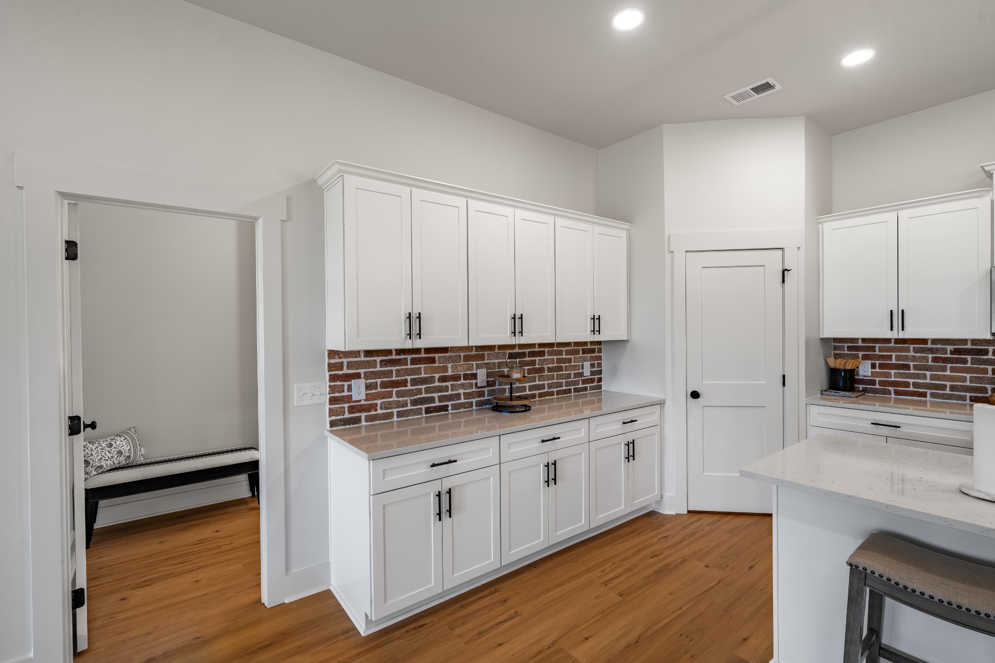 4031 Wells Road Springfield, TN 37172 - Photo 14 of 39 a kitchen with stainless steel appliances a stove and white cabinets
