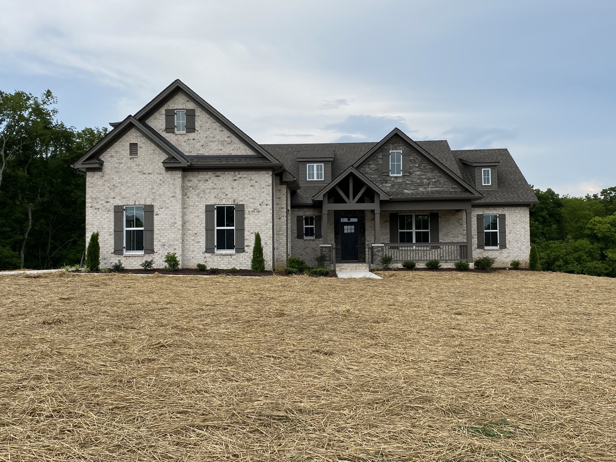 1058 Hideaway Road Columbia, TN 38401 - Photo 1 of 12 a front view of a house with a yard