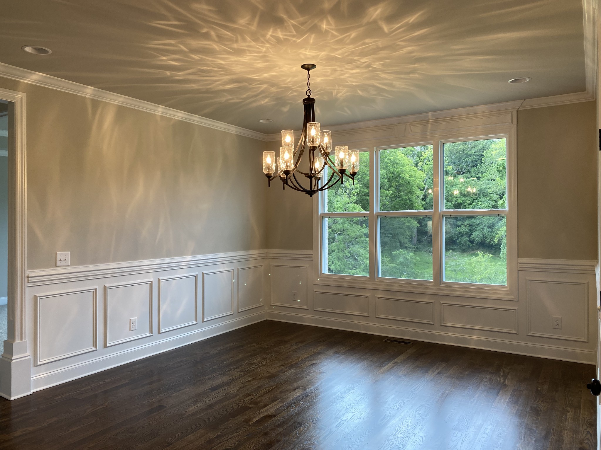 1058 Hideaway Road Columbia, TN 38401 - Photo 4 of 12 a view of an empty room with wooden floor and a window
