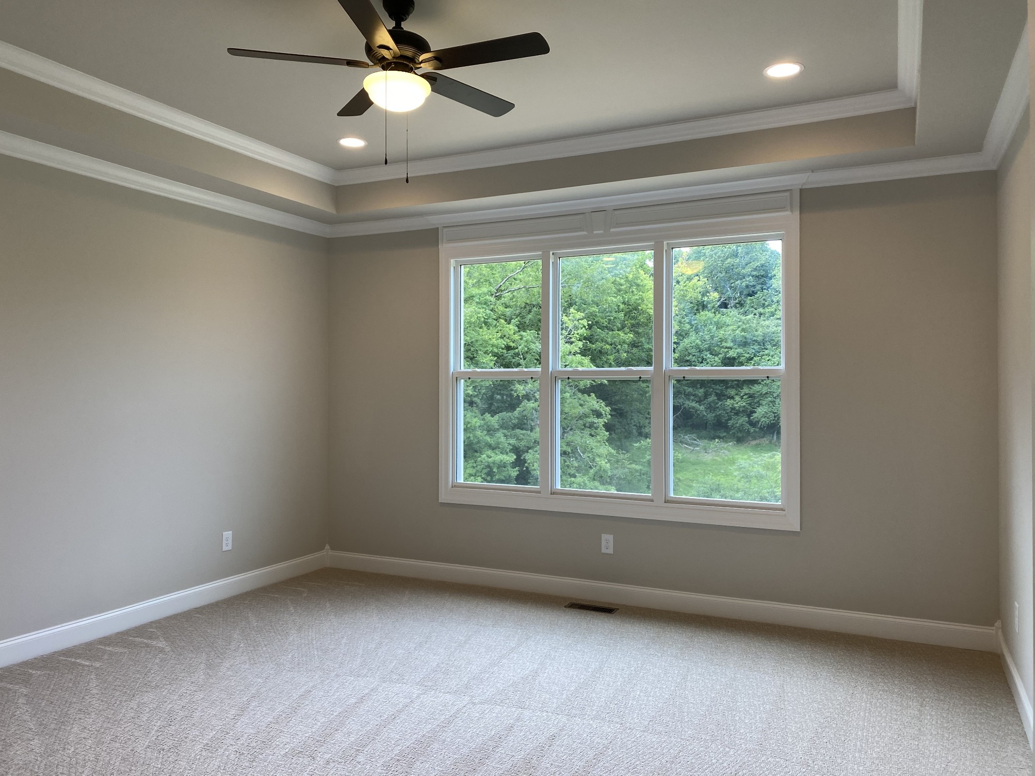 1058 Hideaway Road Columbia, TN 38401 - Photo 6 of 12 an empty room with a window and a fan