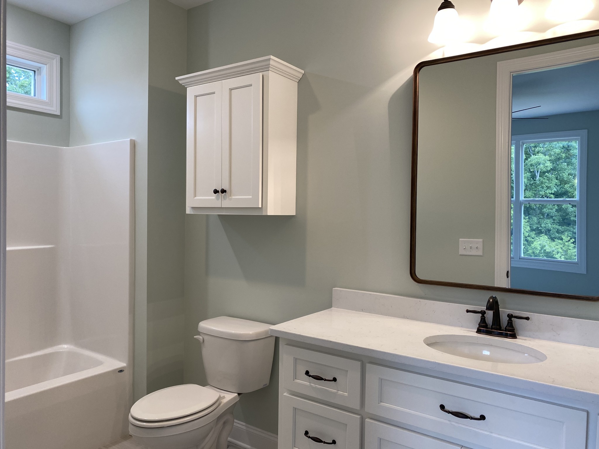 1058 Hideaway Road Columbia, TN 38401 - Photo 9 of 12 a bathroom with a sink a toilet and shower