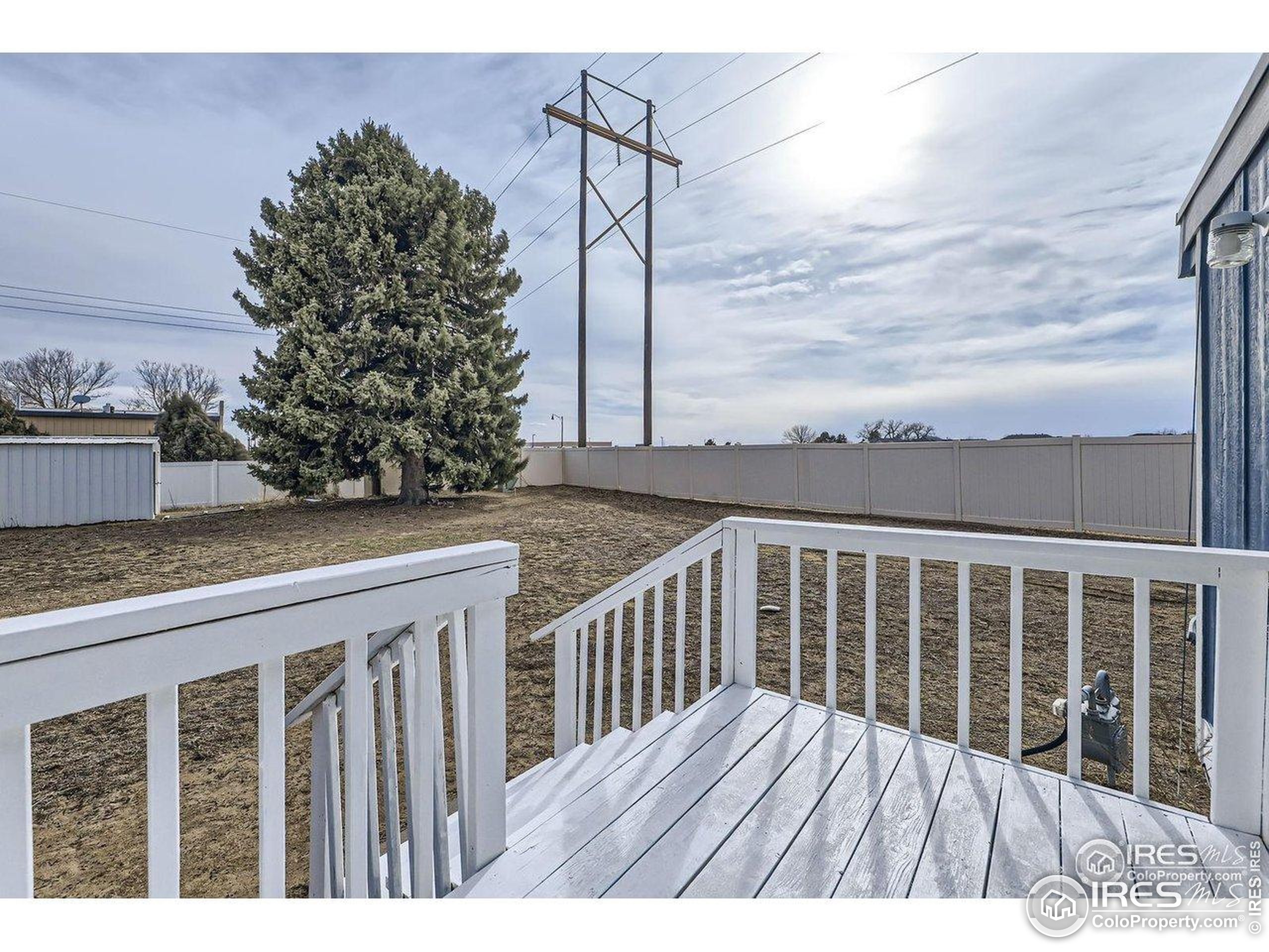 3500 35th Avenue, Unit 3 Greeley, CO 80634 - Photo 1 of 27 a view of wooden deck