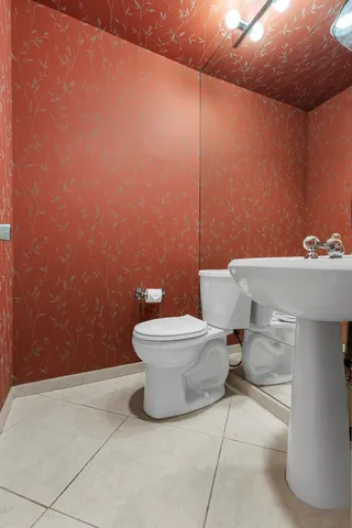 a view of an empty room with a floor to ceiling window