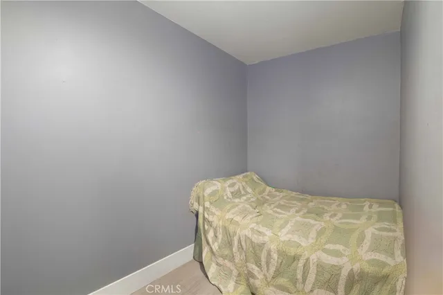 a bedroom with a bed